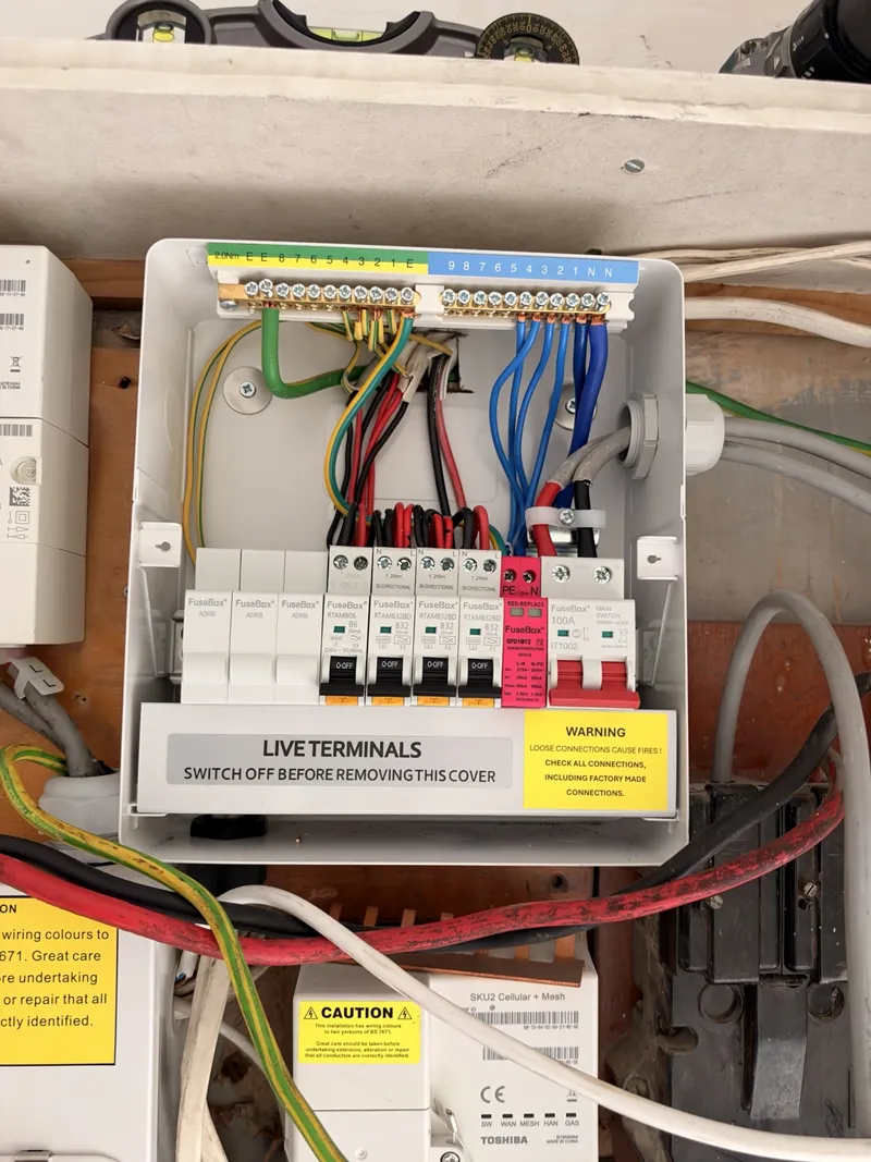 New consumer unit being fitted in a Kilburn NW6 property during a board replacement
