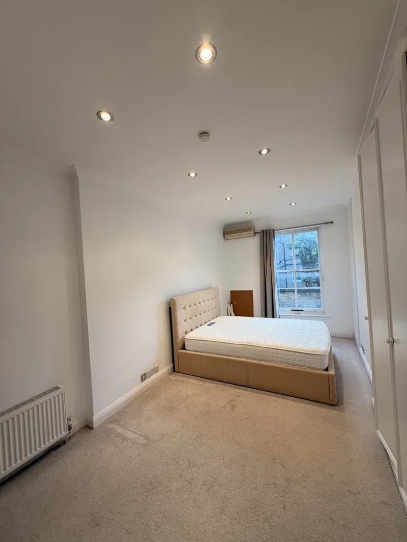 LED downlights installed in a Maida Vale W9 flat bedroom